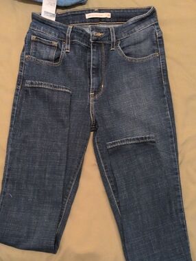 Levi's 721 High Rise Skinny Jeans in Dark Blue with Gold Stitching